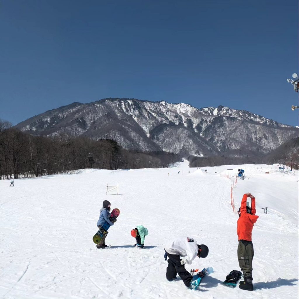 Stretching before snowboarding