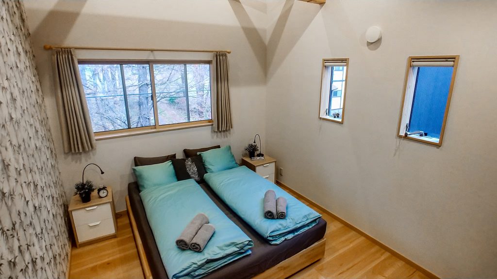 Cozy bedroom in Kitsune Cottage Blue