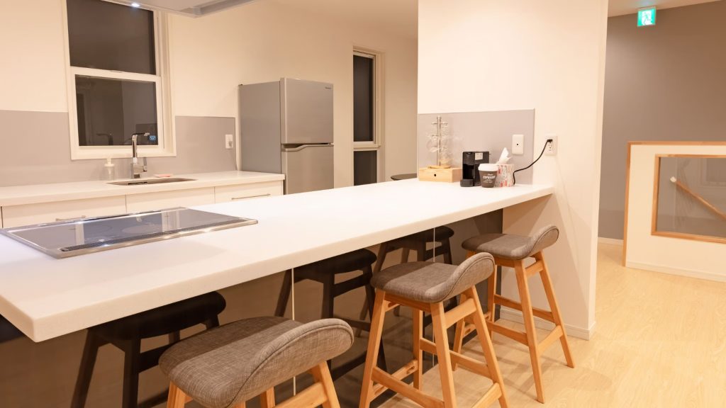 High chair on dining area for kids on Firefly Apartment B