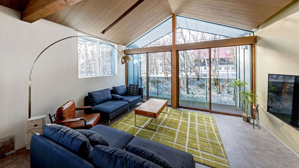 Lovely living room area for families in Grey Wolf Chalet