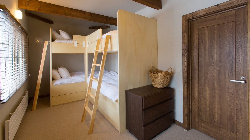 Bunk bed in Greystone Chalets for traveling with kids on family ski trip to Japan
