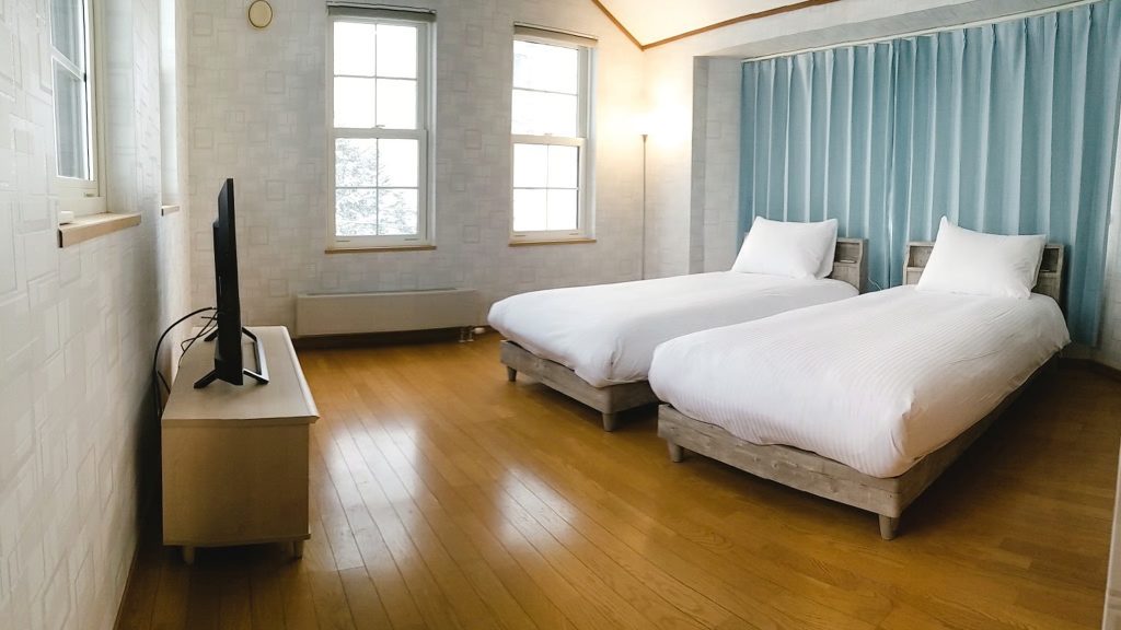 Cozy bedroom of Donguri house with two single beds