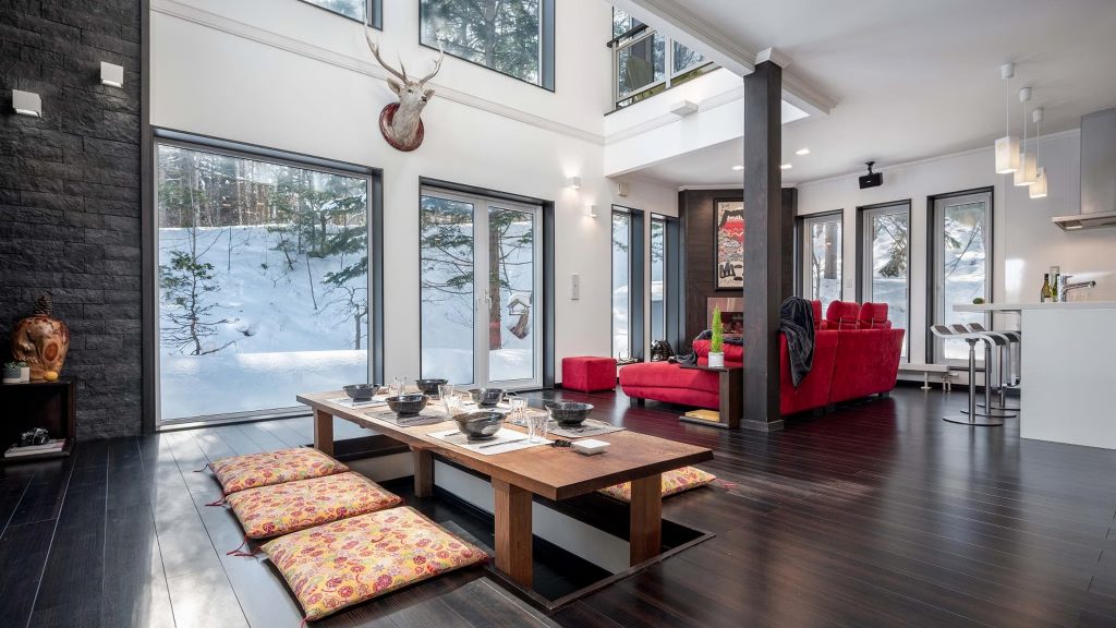 Dining and common room area of Chalet Shochikubai in Furano