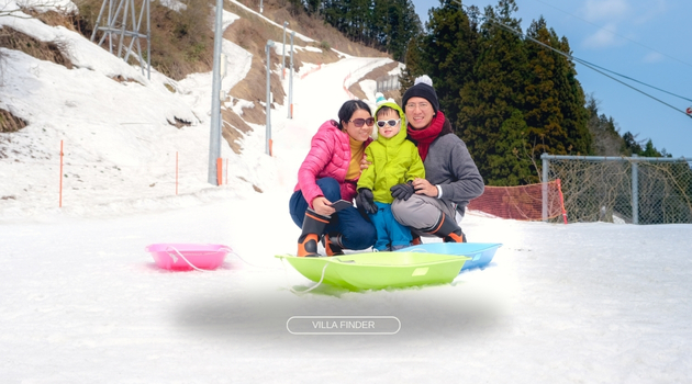 Family Ski Trip to Japan: Playing Snow Slope Near Chalets